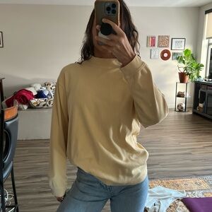 pastel yellow crewneck long sleeve shirt size medium